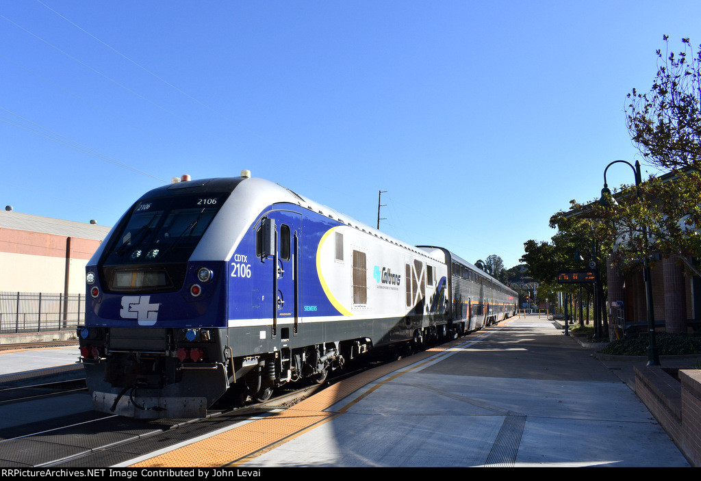 Amtrak Train # 531 arriving into Martinez Station behind Caltrans Charger # 2106 